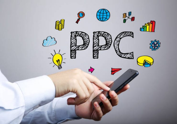 PPC business concept with businessman touching the smartphone.